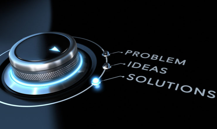 Solution switch positioned on the word solutions over black and blue background. Concept of problem solving.