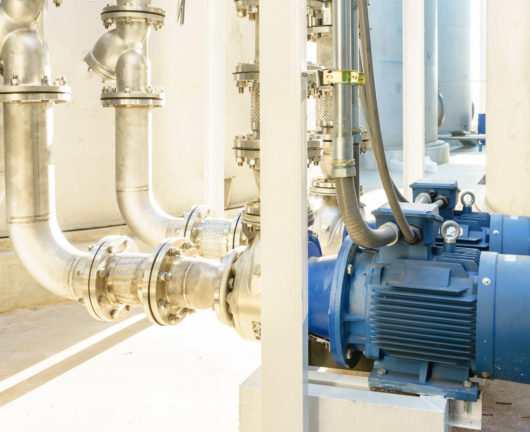 Water pump station and pipeline on roof deck of water tank for industrial work